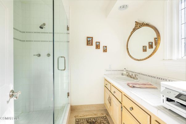 Bathroom, Dual Sink Vanities, Glass Shower, Interior, Recessed Lighting, Tile Countertops