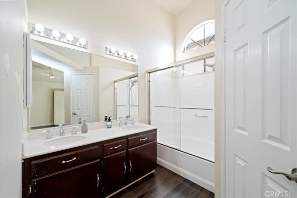 Bathroom, Dual Sink Vanities, Glass Shower, Interior, Wood Texture Flooring