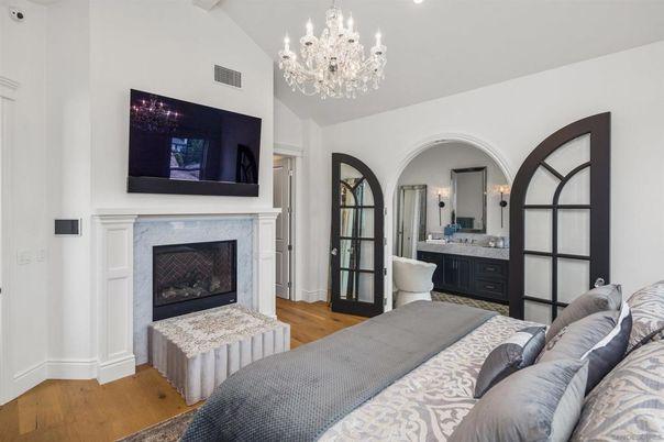 Bedroom, Chandelier, Fireplace, Interior, Recessed Lighting, Wood Texture Flooring