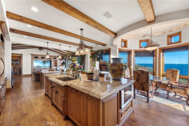 Chandelier, Dining room, Interior, Kitchen, Pendant Lights, Recessed Lighting, Water, Wooden Beams, Wood Texture Flooring