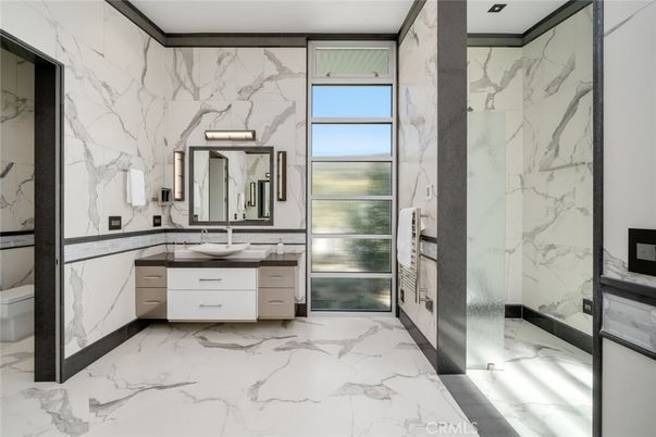 Bathroom, Dual Sink Vanities, Interior, Marble, Marble Walls, Recessed Lighting