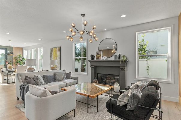Dining room, Fireplace, Interior, Living room, Pendant Lights, Recessed Lighting, Wood Texture Flooring
