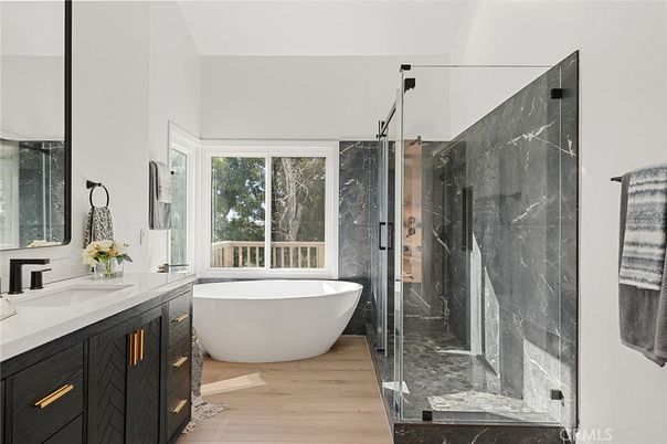 Bathroom, Dual Sink Vanities, Free Standing Baths, Glass Shower, Interior, Marble Walls, Wood Texture Flooring