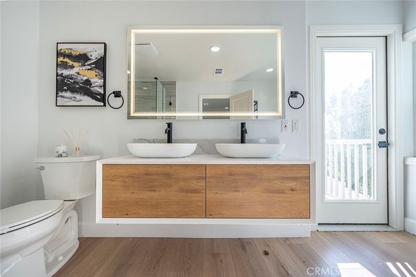 Bathroom, Dual Sink Vanities, Interior, Recessed Lighting, Wood Texture Flooring