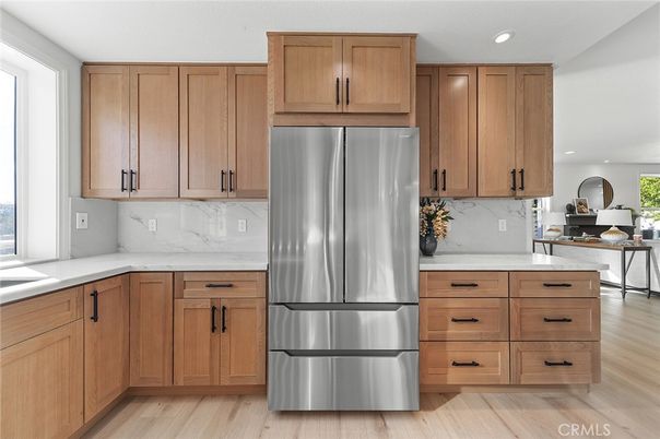 Interior, Kitchen, Marble Walls, Recessed Lighting, Stainless Steel Appliances, Wood Texture Flooring