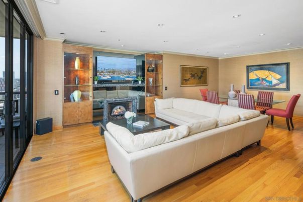 Dining room, Fireplace, Interior, Living room, Recessed Lighting, Wood Texture Flooring