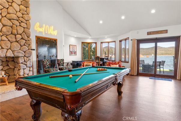 Billiard Table, Game Room, Interior, Recessed Lighting, Stone Walls, Wood Texture Flooring