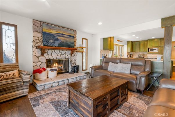 Fireplace, Interior, Kitchen, Living room, Recessed Lighting, Stone Walls, Wood Texture Flooring
