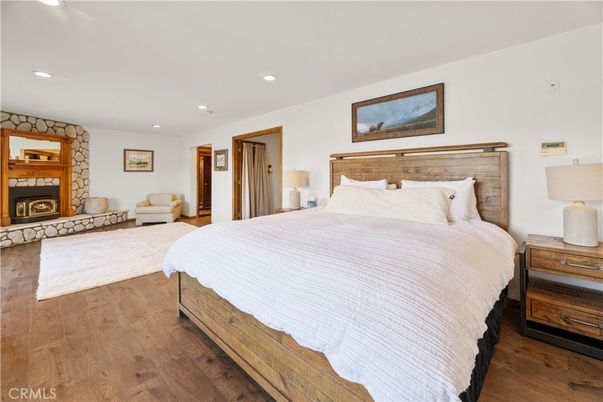 Bedroom, Fireplace, Interior, Recessed Lighting, Wood Texture Flooring