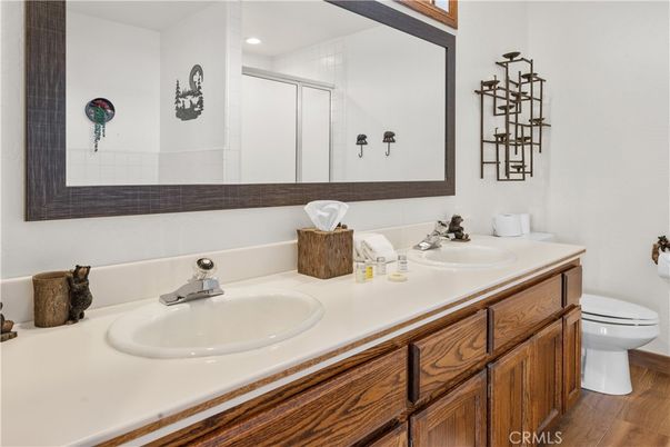 Bathroom, Dual Sink Vanities, Interior, Recessed Lighting, Wood Texture Flooring