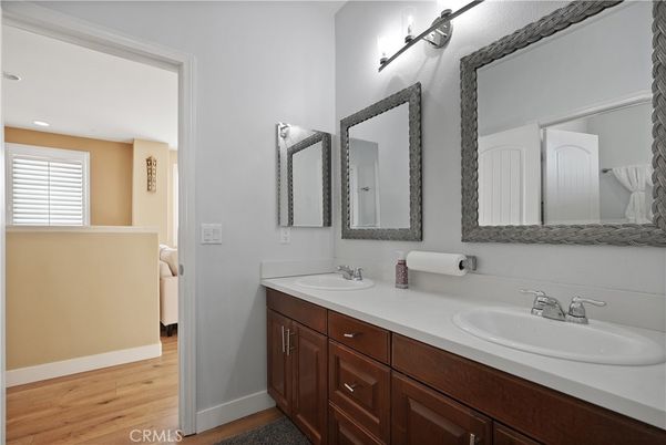 Bathroom, Dual Sink Vanities, Interior, Recessed Lighting, Wood Texture Flooring