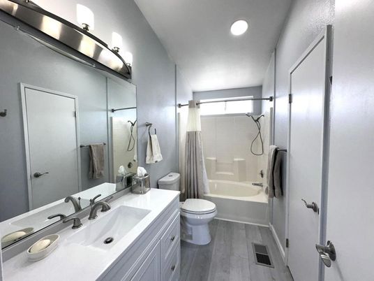 Bathroom, Dual Sink Vanities, Interior, Recessed Lighting, Wood Texture Flooring