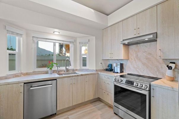Interior, Kitchen, Marble Walls, Stainless Steel Appliances, Wood Texture Flooring