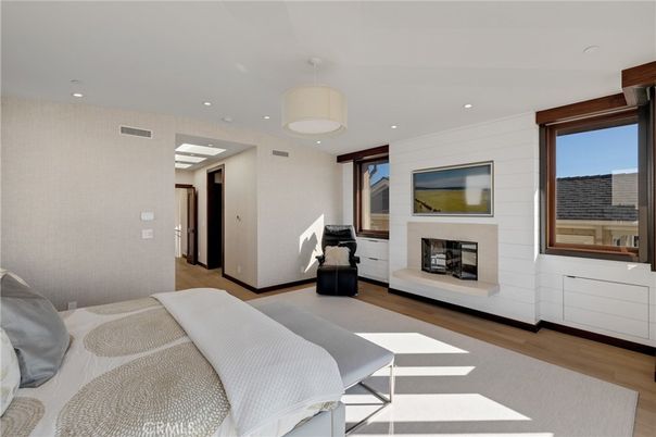 Bedroom, Fireplace, Interior, Pendant Lights, Recessed Lighting, Wood Texture Flooring