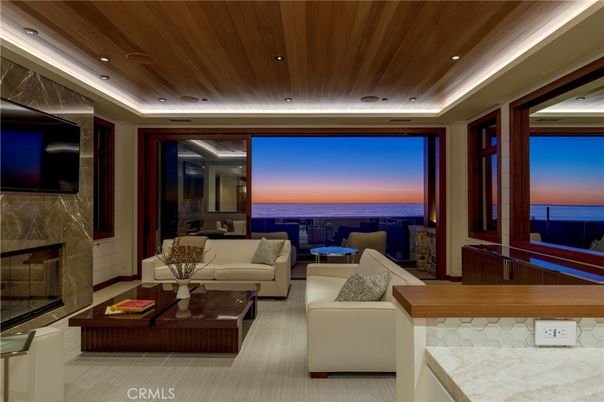 Fireplace, Interior, Living room, Recessed Lighting, Water, Wooden Ceilings