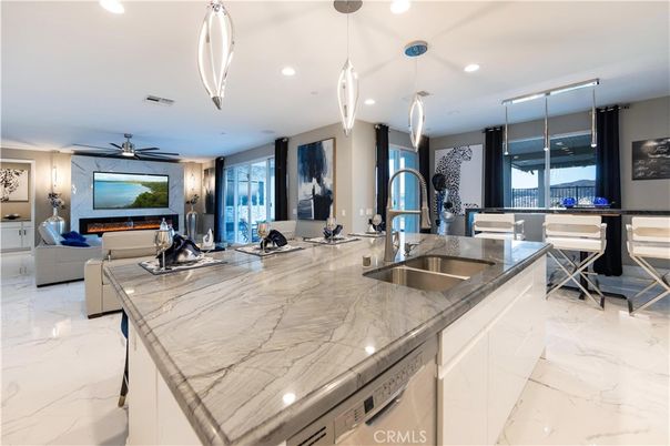 Fireplace, Interior, Kitchen, Living room, Marble, Pendant Lights, Recessed Lighting, Stainless Steel Appliances