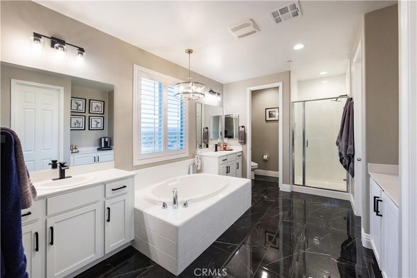 Bathroom, Dual Sink Vanities, Glass Shower, Interior, Marble, Pendant Lights, Recessed Lighting