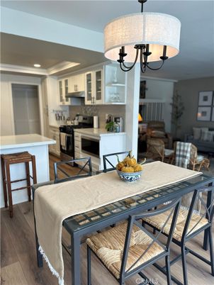 Chandelier, Dining room, Interior, Kitchen, Living room, Recessed Lighting, Wood Texture Flooring