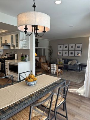 Chandelier, Dining room, Interior, Kitchen, Living room, Recessed Lighting, Wood Texture Flooring
