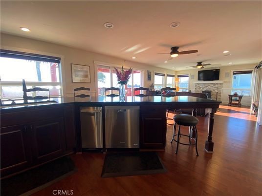 Fireplace, Interior, Kitchen, Recessed Lighting, Stone Walls, Wood Texture Flooring