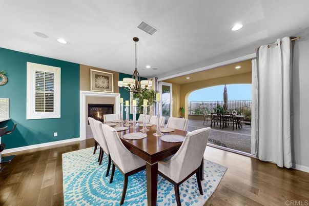 Dining room, Fireplace, Interior, Pendant Lights, Recessed Lighting, Wood Texture Flooring