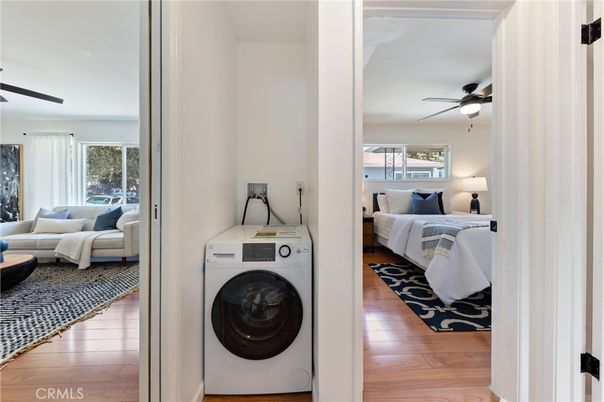 Bedroom, Interior, Living room, Utility Closets, Washer, Wood Texture Flooring