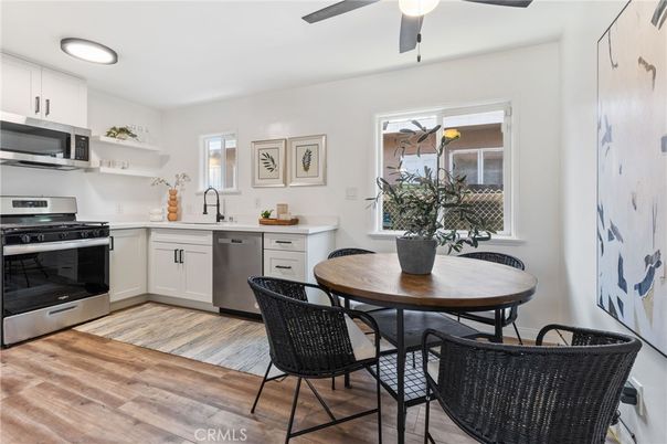 Dining room, Interior, Kitchen, Recessed Lighting, Stainless Steel Appliances, Wood Texture Flooring