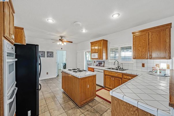 Interior, Kitchen, Recessed Lighting, Tile Countertops