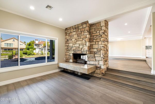 Fireplace, Interior, Recessed Lighting, Stone Walls, Wood Texture Flooring