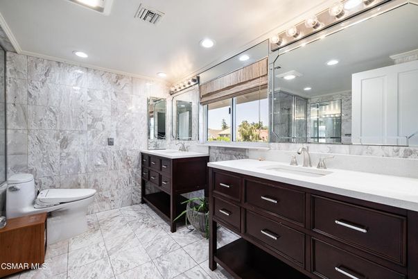 Bathroom, Dual Sink Vanities, Glass Shower, Interior, Marble, Marble Walls, Recessed Lighting