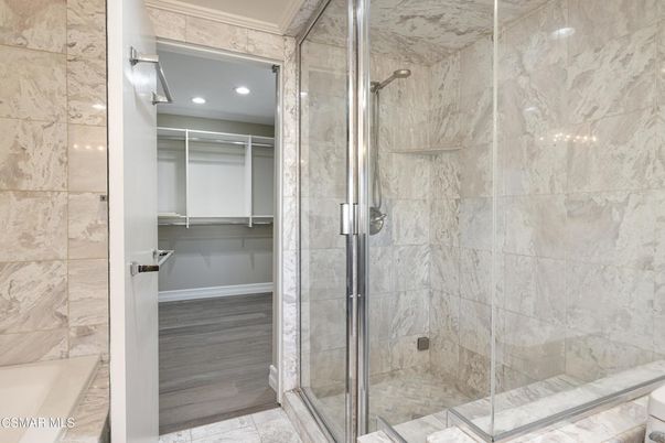 Bathroom, Glass Shower, Interior, Marble Walls, Recessed Lighting, Walk-in Closets, Wood Texture Flooring