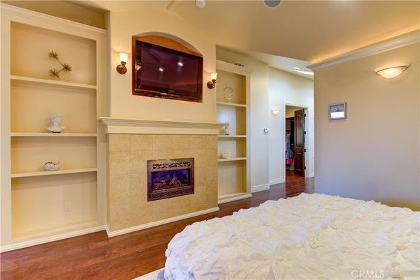 Bedroom, Fireplace, Interior, Recessed Lighting, Wood Texture Flooring