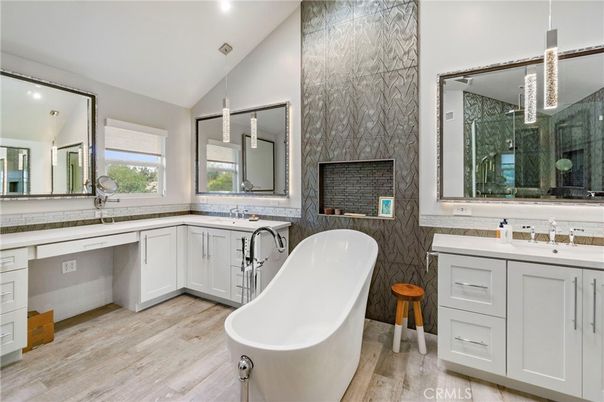 Bathroom, Dual Sink Vanities, Free Standing Baths, Interior, Recessed Lighting, Wood Texture Flooring