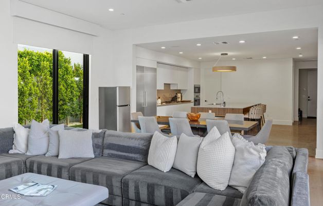 Dining room, Interior, Kitchen, Living room, Pendant Lights, Recessed Lighting, Stainless Steel Appliances, Wood Texture Flooring