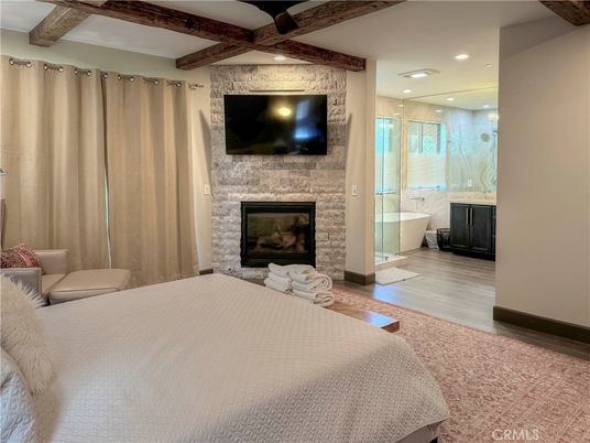 Bathroom, Bedroom, Fireplace, Free Standing Baths, Interior, Recessed Lighting, Stone Walls, Wooden Beams, Wood Texture Flooring