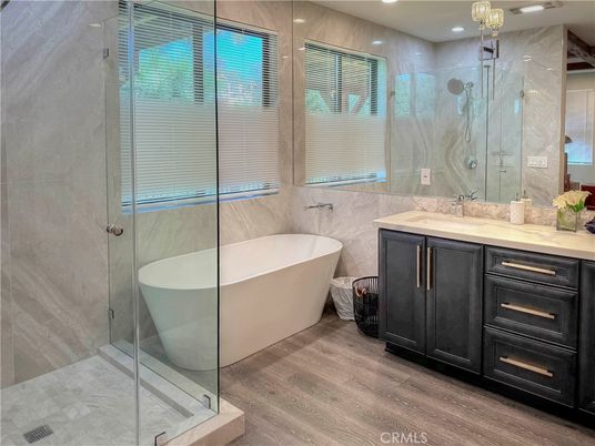 Bathroom, Free Standing Baths, Glass Shower, Interior, Recessed Lighting, Wood Texture Flooring