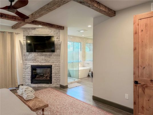 Bathroom, Fireplace, Free Standing Baths, Interior, Recessed Lighting, Stone Walls, Wooden Beams, Wood Texture Flooring