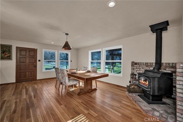 Dining room, Fireplace, Interior, Pendant Lights, Recessed Lighting, Wood Texture Flooring