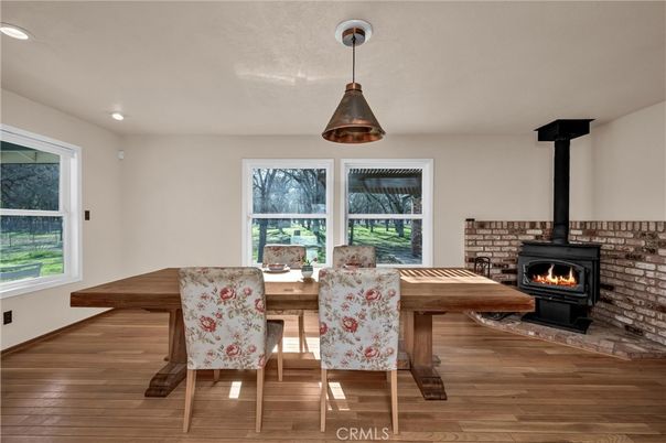 Dining room, Fireplace, Interior, Pendant Lights, Recessed Lighting, Wood Texture Flooring