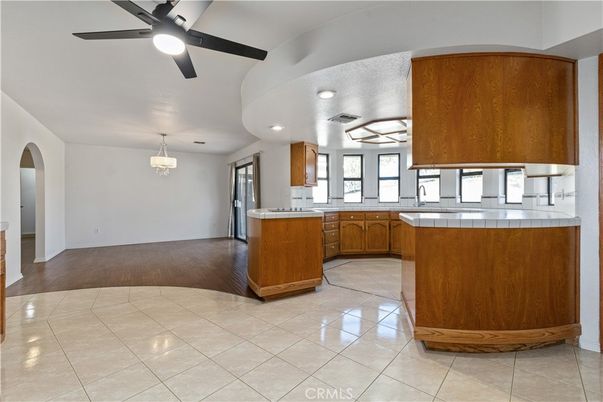 Interior, Kitchen, Pendant Lights, Recessed Lighting, Tile Countertops, Wood Texture Flooring
