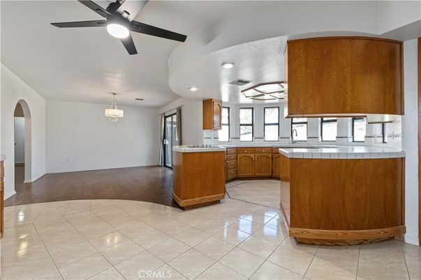 Interior, Kitchen, Pendant Lights, Recessed Lighting, Tile Countertops, Wood Texture Flooring