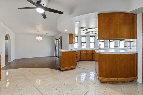 Interior, Kitchen, Pendant Lights, Recessed Lighting, Tile Countertops, Wood Texture Flooring