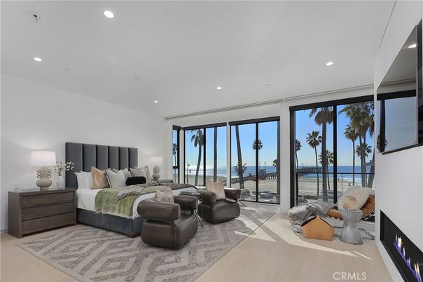 Bedroom, Fireplace, Interior, Recessed Lighting, Water, Wood Texture Flooring