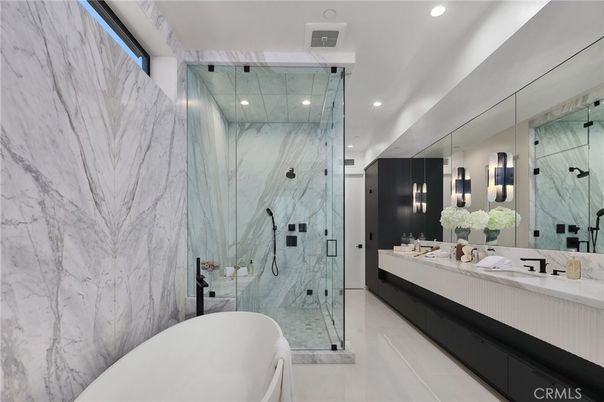 Bathroom, Dual Sink Vanities, Free Standing Baths, Glass Shower, Interior, Marble Walls, Recessed Lighting