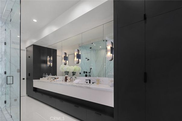 Bathroom, Dual Sink Vanities, Glass Shower, Interior, Marble Walls, Recessed Lighting