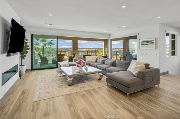Fireplace, Interior, Living room, Recessed Lighting, Water, Wood Texture Flooring
