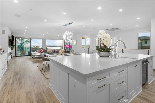Dining room, Interior, Kitchen, Living room, Pendant Lights, Recessed Lighting, Stainless Steel Appliances, Wood Texture Flooring