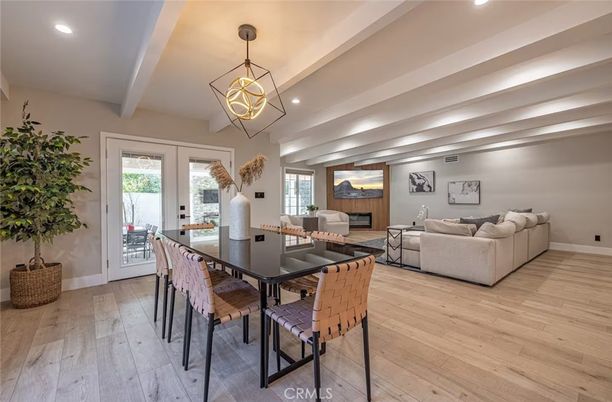 Dining room, Fireplace, Interior, Living room, Pendant Lights, Recessed Lighting, Wood Texture Flooring