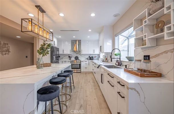 Interior, Kitchen, Marble Walls, Pendant Lights, Recessed Lighting, Wood Texture Flooring