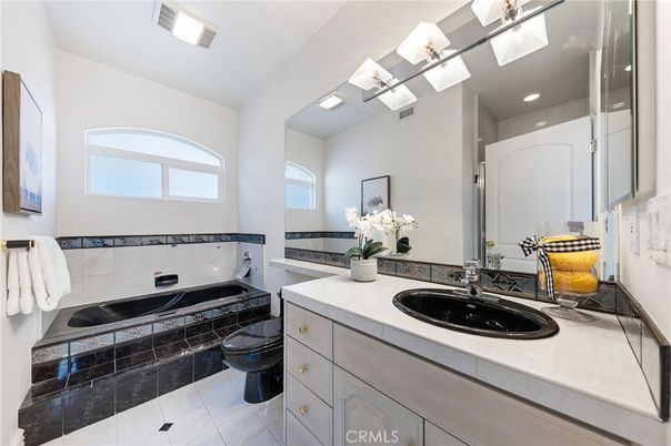 Bathroom, Dual Sink Vanities, Interior, Recessed Lighting, Tile Countertops